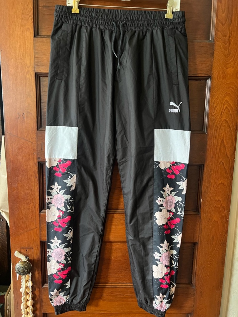 Puma Black Track Pants with Pink Floral Side Panels